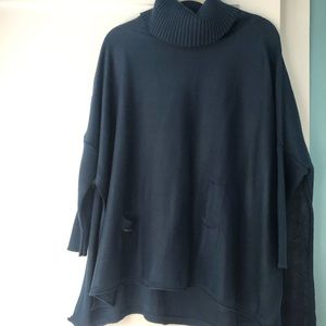 Beautiful poncho with turtleneck